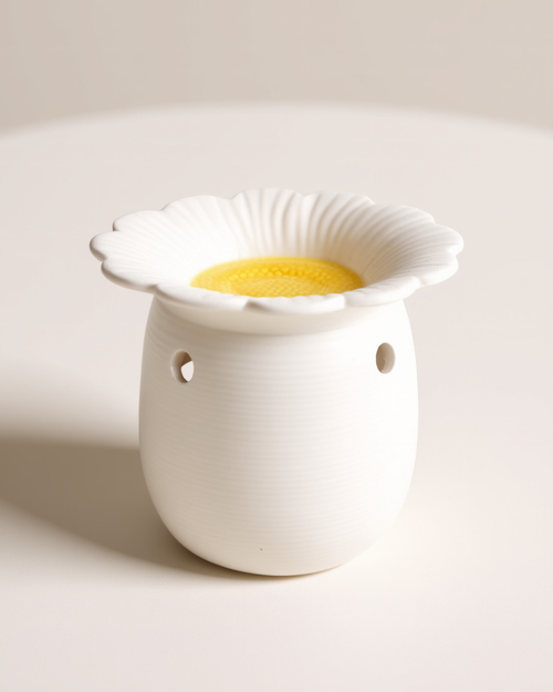 Daisy Shaped Oil Burner & Wax Warmer ceramic mug or home décor item.
